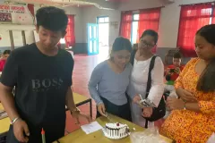 Nepal-girls-eating-cake-4-2024-07-13-at-1.09.35-PM